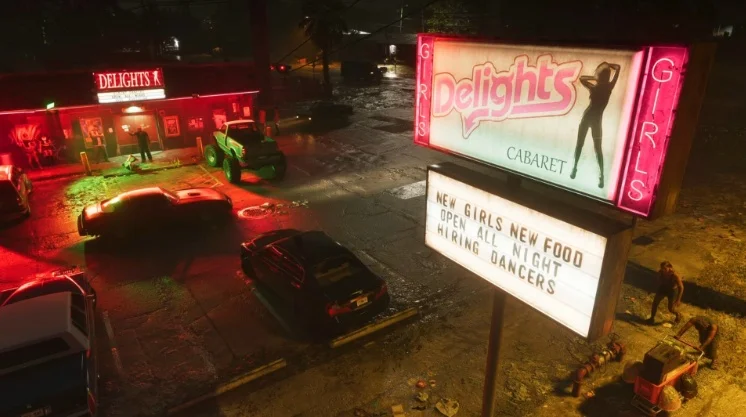 A shot of the Delights Cabaret building with neon 'Girls' signs.