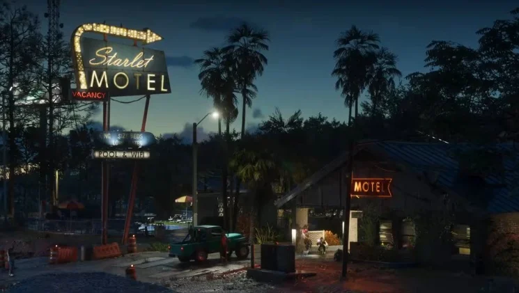 A night time shot of the Starlet Motel with its neon sign.