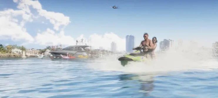 Lucia and Jason riding a bright green Seashark jet ski across the water.