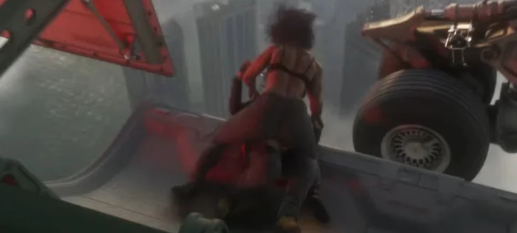 Lucia performing an action move inside a helicopter hovering over the city.